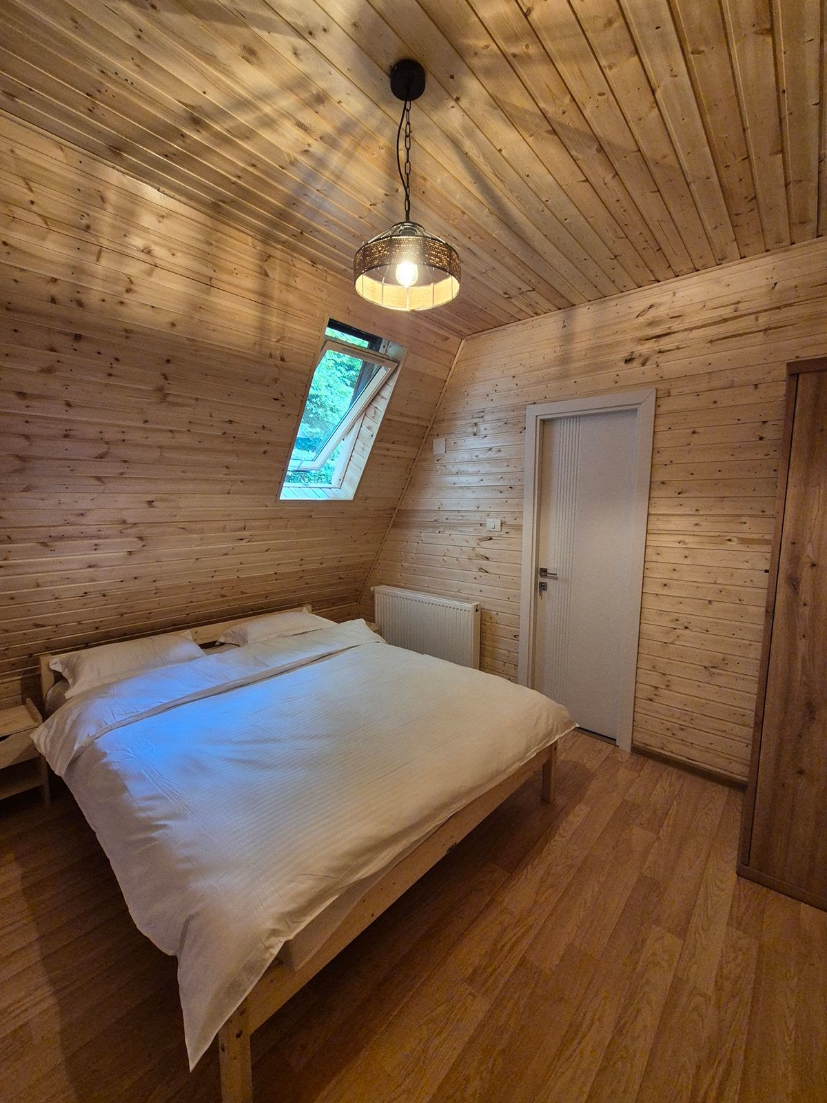 Dormitor la etaj cu luminator